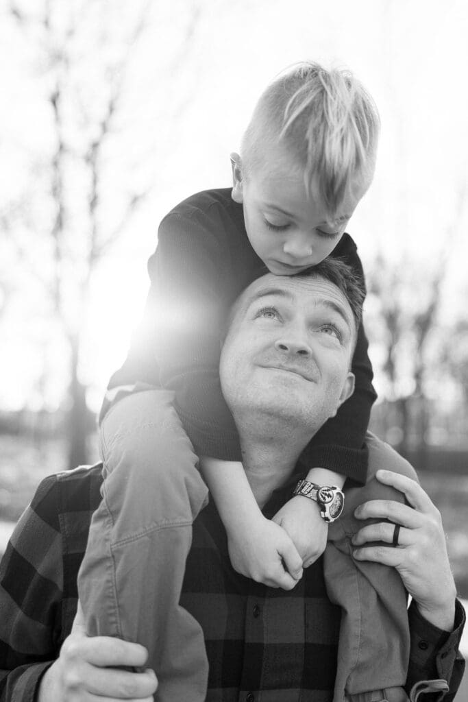 Son on father's shoulders