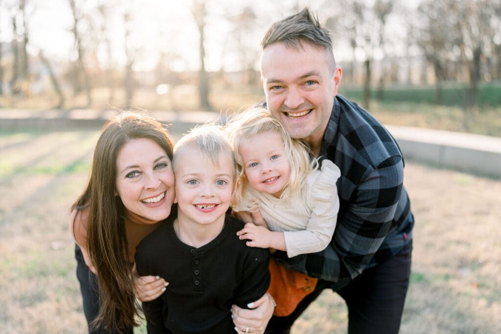 Family smiling at Renaissance Park, Chattanooga, TN.